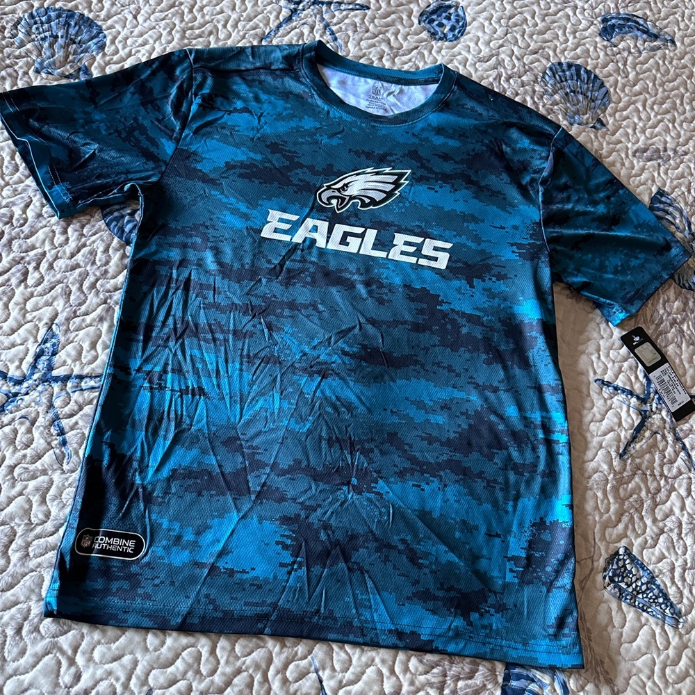 NFL Youth Blue/Aqua black Patterned Shirt Size XL 18-30 Pit to pit 20” NEW
